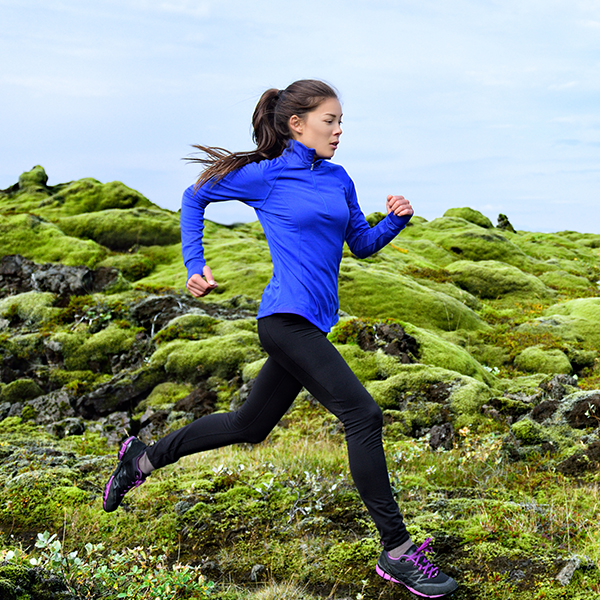 Woman running on a mountain Woman running on a mountain